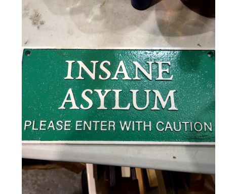 Cast iron Insane Asylum sign, W: 30 cm. UK P&amp;P Group 2 (£20+VAT for the first lot and £4+VAT for subsequent lots)