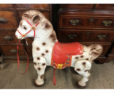 A vintage child's Mobo Bronco ride-on horse  
