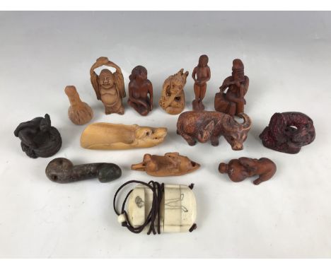 A quantity of reproduction netsuke etc