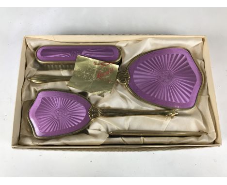 A vintage Rondis brush set