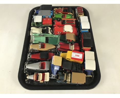 Twenty-four Matchbox die-cast model vans and cars including Nestle milk, a BP tanker and Kelloggs etc