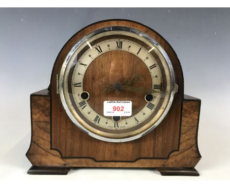 An Enfield oak and walnut mantel clock