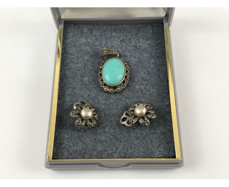 A vintage turquoise, marcasite and white-metal pendant, together with a pair of marcasite clip-on earrings 