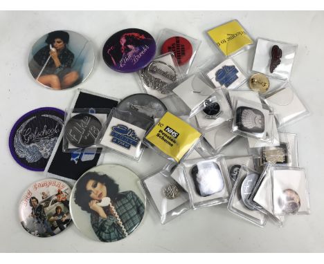 A quantity of rock and pop related button and lapel badges etc