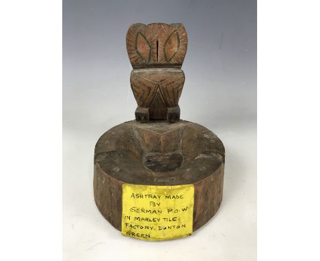 A carved wooden ashtray made by a German prisoner of war in the Marley Tile Factory, Dunston Green 