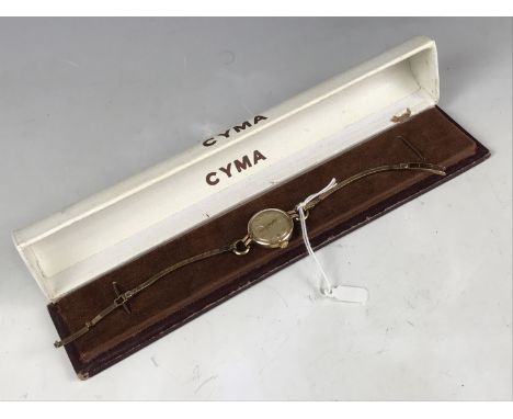 A lady's vintage Cyma gold cased wristlet watch on a 9ct gold strap, in original Cyma presentation case, 15.9g