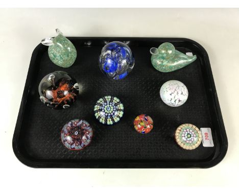 Nine paperweights including a rabbit, a duck and a Caithness Moonflower paperweight etc
