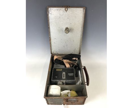 A vintage Setright bus conductor's ticket machine with case