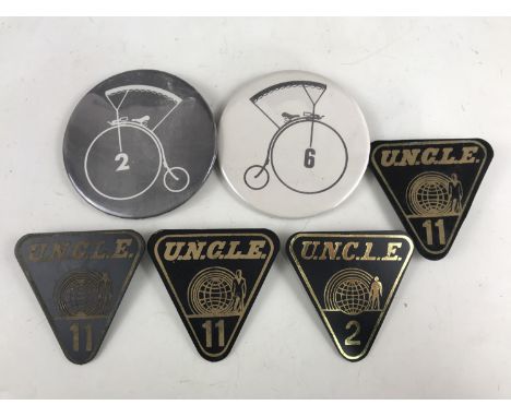 A number of Man From UNCLE and The Prisoner button badges