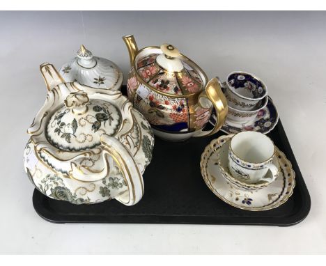 A late 18th century Worcester Flight &amp; Barr trio together with two teapots, a sucrier and a trio