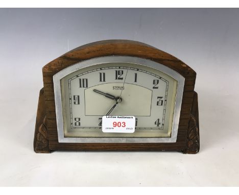 A vintage Stirling electric mantel clock