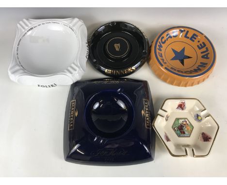 A collection of four breweriana advertising ashtrays, to include Newcastle Brown Ale, Guinness, Martell Cognac and Eoliki, to