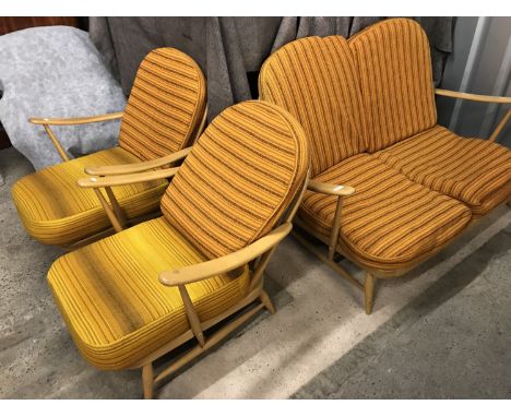 An Ercol blonde beech cottage suite, circa 1970s, (cushions for photographic purposes only)