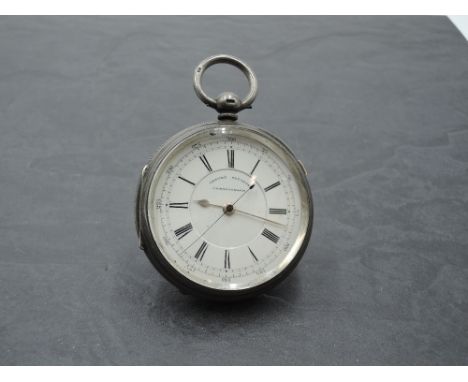 A Victorian silver key wound centre face chronograph pocket watch by Rhodes of Kendal having Roman numeral face with paramete
