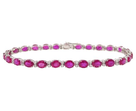 18ct white gold oval ruby and round brilliant cut diamond bracelet, stamped, total ruby weight approx 9.85 caratCondition Rep
