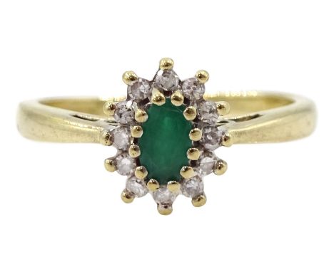 9ct gold oval emerald and round brilliant cut diamond cluster ring, hallmarkedCondition Report:Approx 2.4gm, size M, overall 