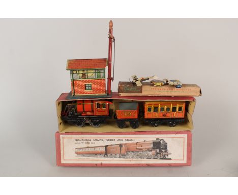 Boxed British tin plate mechanical engine, tender and coach, Gaiety toy miniature die cast train set plus tin plate signal bo
