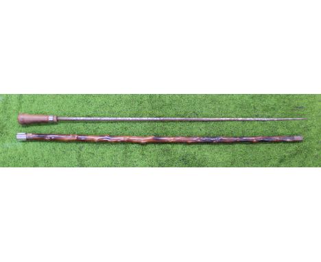 A sword stick, scabbard and grip (both as found)