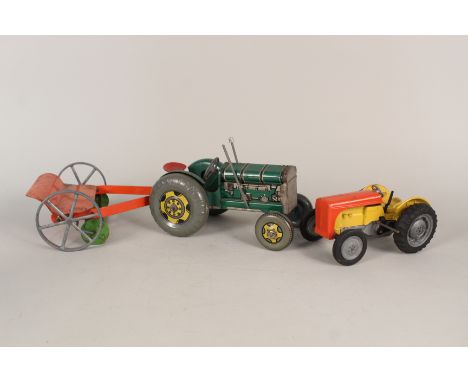 A Mettoy tin plate tractor and mower plus Mettoy die cast tractor