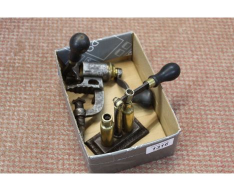 A 12 bore reloading tool with a 12 bore de-capping tool by Dixon