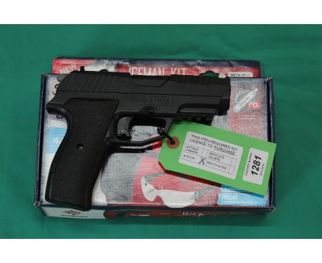 A Crosman 'Iceman' .177 CO2 air pistol in original box, as a post 1939 air weapon the restrictions of the Crime Reduction Act
