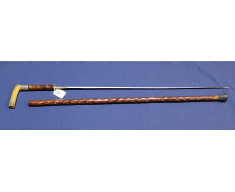 A sword stick with silver collar and horn grip
