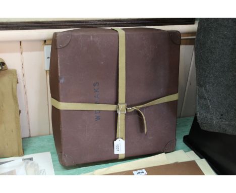 A film case with webbing straps marked W.D. (broad arrow) A.K.S.