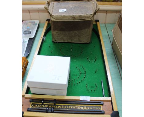 A German iron childs sewing machine plus a bagatelle board and skittles