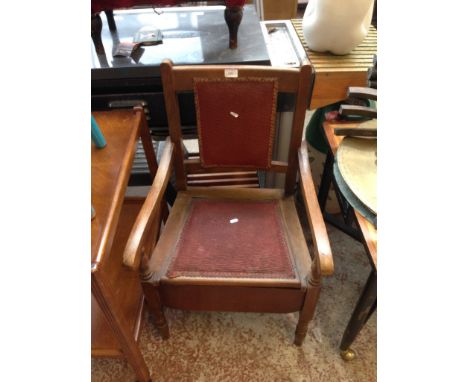 A COMMODE CHAIR