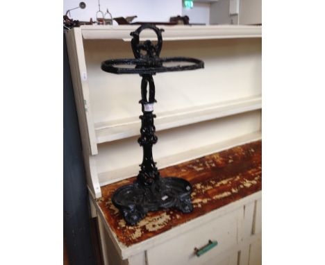 A CAST IRON STICK STAND