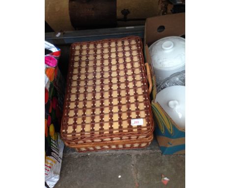 A PICNIC HAMPER BASKET