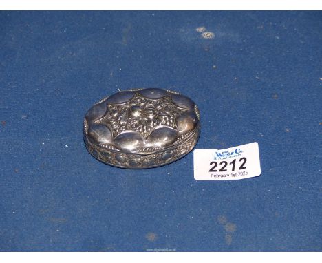 An Alpaca silver gilt Snuff Box with embossed decoration of harvest fruits and vegetables.