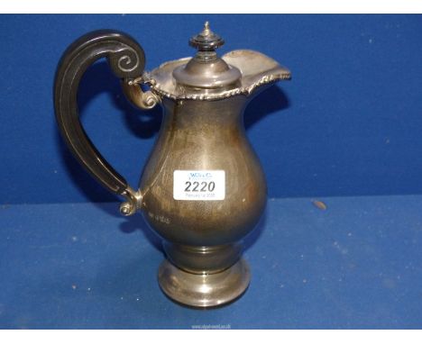 An Irish Silver hot water Pot with bakelite handle and finial, Dublin 1921, maker R & Co, total weight 649 gms including hand
