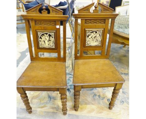 Pair of chairs with inlaid tile backs, carved