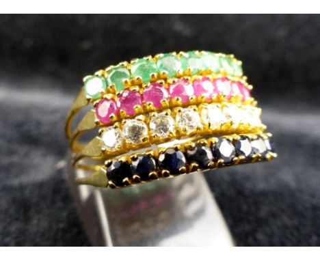 18 ct gold ring set with rows of emeralds rubies, cz and sapphires. Size R