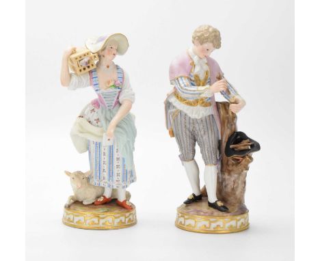 Late 19th or early 20th Century Meissen figure of a shepherdess, after Michel Victor Acier, modelled with a caged dove on her