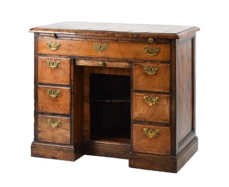 18th Century pollard oak and walnut country kneehole desk, the rectangular moulded top with central pollarded oak panel withi