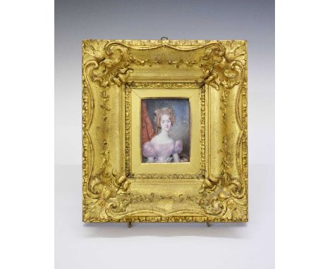 Mid 19th Century watercolour portrait miniature on ivory, depicting a young lady with auburn ringlets, wearing a pale pink dr
