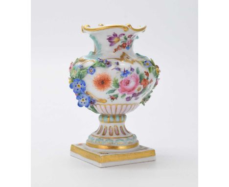 Late 19th or early 20th Century Meissen miniature vase, of baluster pedestal form painted and gilded with floral panels withi