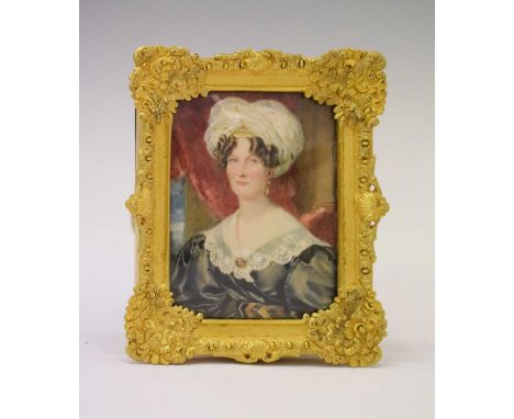 Early 19th Century English School - Oil on ivory - Half-length portrait miniature of a lady, circa 1830, in finely cast ormol