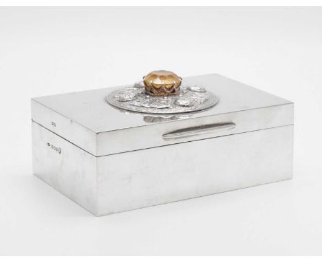 Elizabth II silver cigarette box, the hinged rectangular cover, applied with Scottish-style decoration, a citrine or 'Cairngo