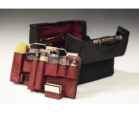 Late Victorian silver vanity case, in the form of a black Morocco Gladstone bag, enclosing a wine silk-lined interior with re