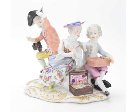 Ludwigsburg porcelain figural group, modelled as a young lady and two suitors on a rocky outcrop, underglaze blue crown mark 