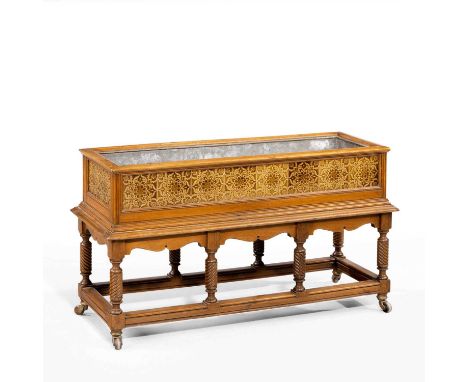Late Victorian walnut and tile mounted jardinière, of rectangular form with zinc lining, the sides inset with floral ceramic 