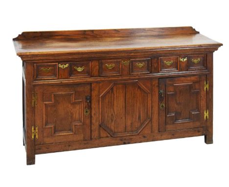 Late 17th Century style oak low dresser or sideboard, the rectangular top with galleried back over three geometric moulded fr