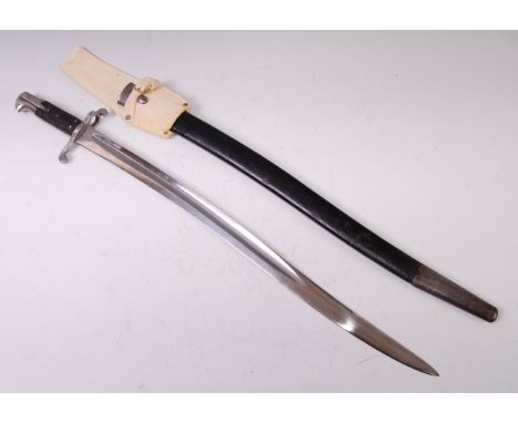 A British 1856 pattern bayonet, the 58cm Yataghan shaped fullered blade stamped to the ricasso with War Department mark with 