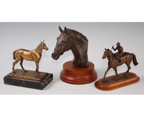 A bronzed resin bust of a racehorse on a socle base, inscribed Terry Wall? Rockbarton and numbered 170 h.18cm, together with 