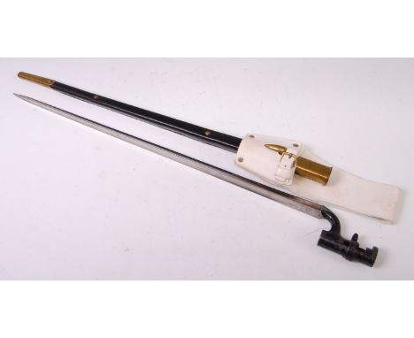 A British 1853/58 pattern socket bayonet, the 55cm triform fullered blade with War Department mark and crowned E for Enfield,