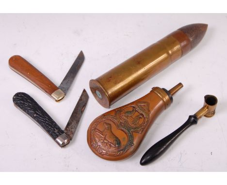 A 19th century shot measure, together with a copper powder flask, inert shell and two pocket knives. (5)