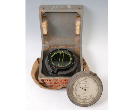 A WW II R.A.F. Type P8 flying compass, serial number 92326 H, with Air Ministry label, in fitted wooden case, together with a